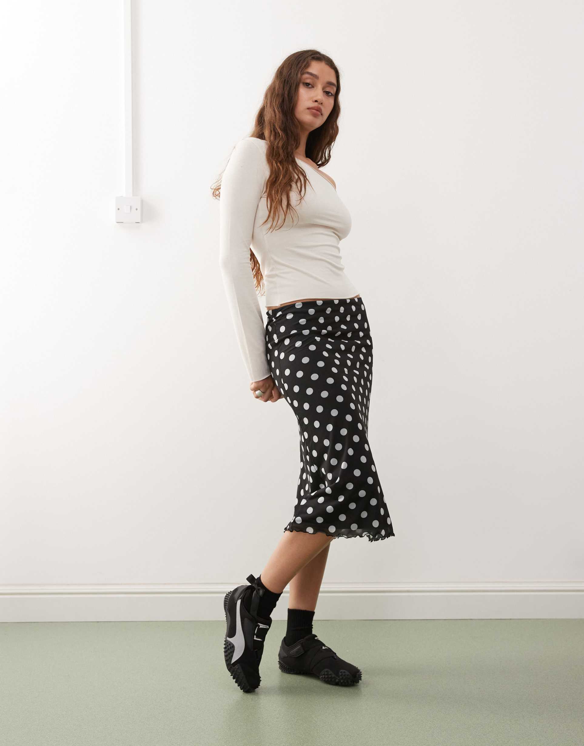 reclaimed vintage mesh midi skirt in black and white polka dot print