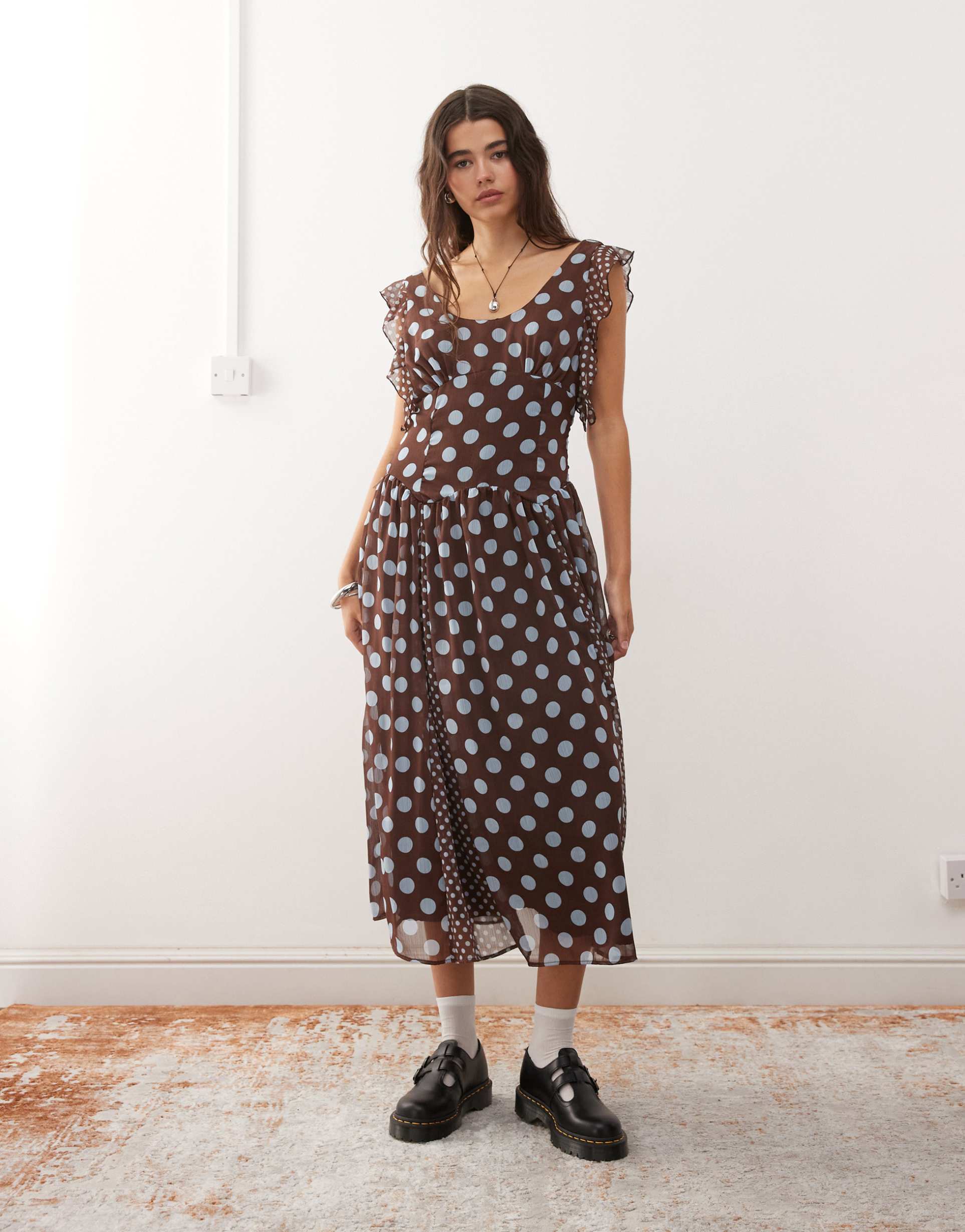reclaimed vintage midi dress with panels and ruffles in brown and blue polka dot