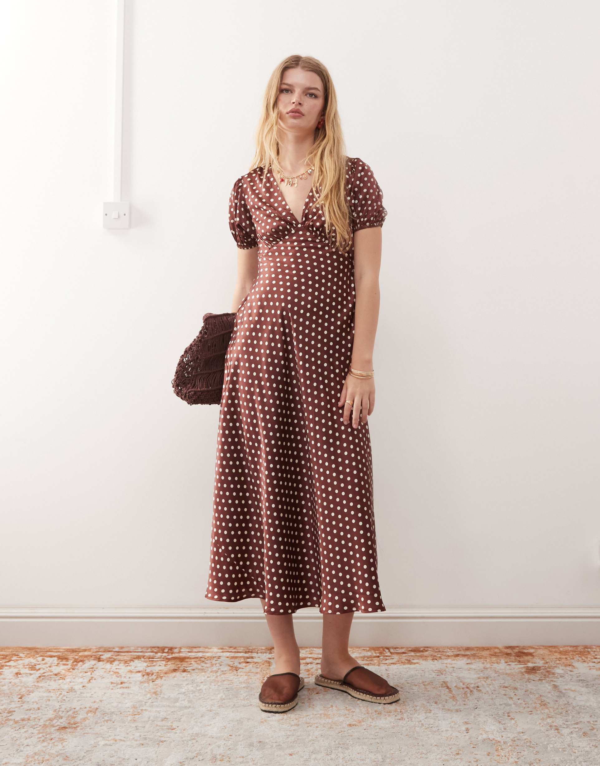 reclaimed vintage midi tea dress with puff sleeves and cross back in brown polka dots