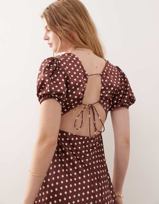 Reclaimed Vintage midi tea dress with puff sleeves and cross back in brown polka dots