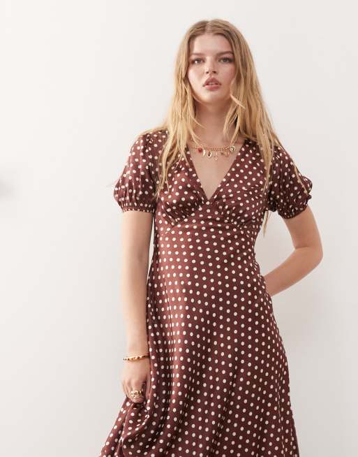Reclaimed Vintage midi tea dress with puff sleeves and cross back in brown polka dots