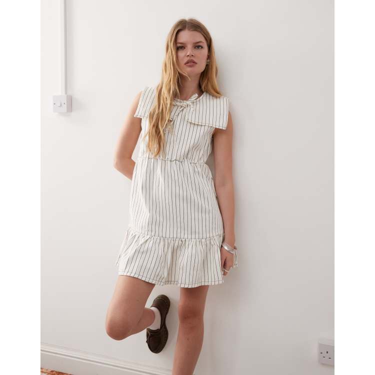 Reclaimed Vintage mini denim dress with sailor collar and frill hem in ecru  pinstripes | ASOS