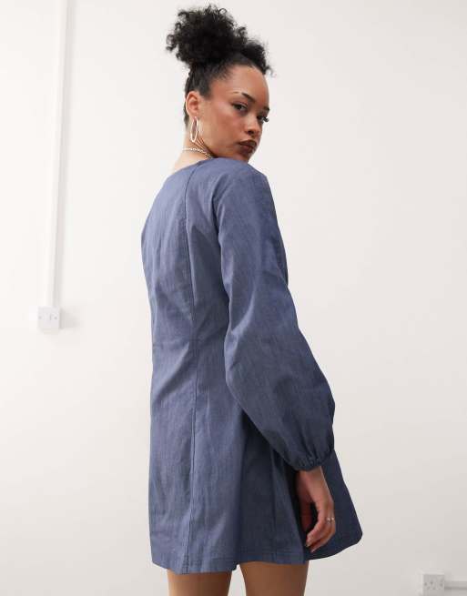 Reclaimed Vintage mini dress with balloon sleeves in blue denim look | ASOS