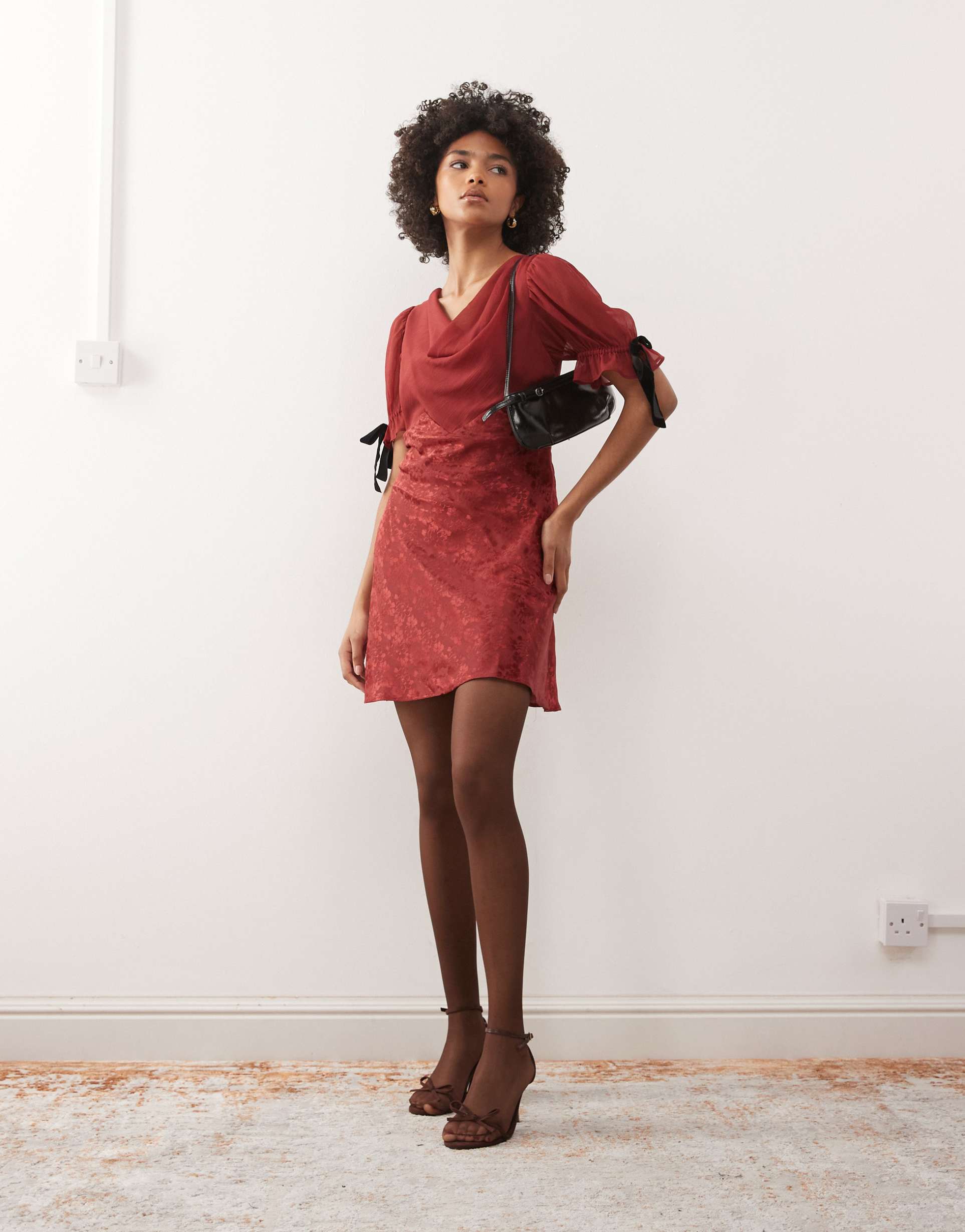 reclaimed vintage mini dress with bow puff sleeves in burgundy satin jacquard