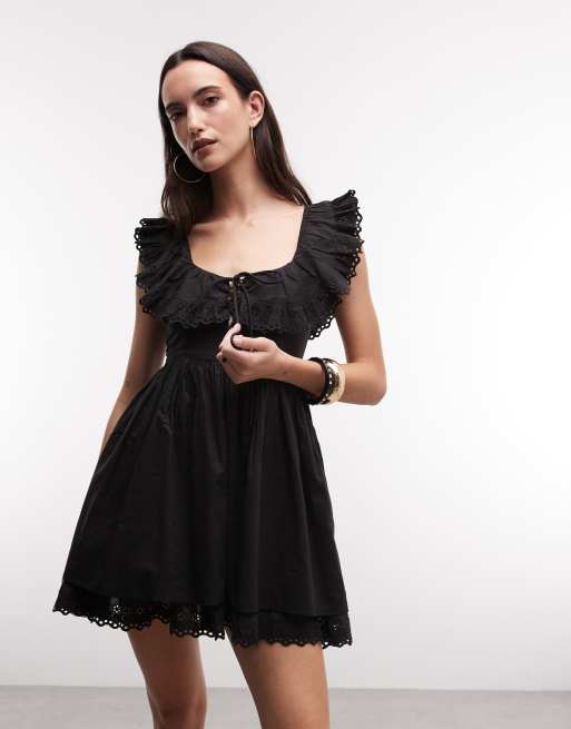 Reclaimed Vintage mini dress with broderie sleeves and hem in black