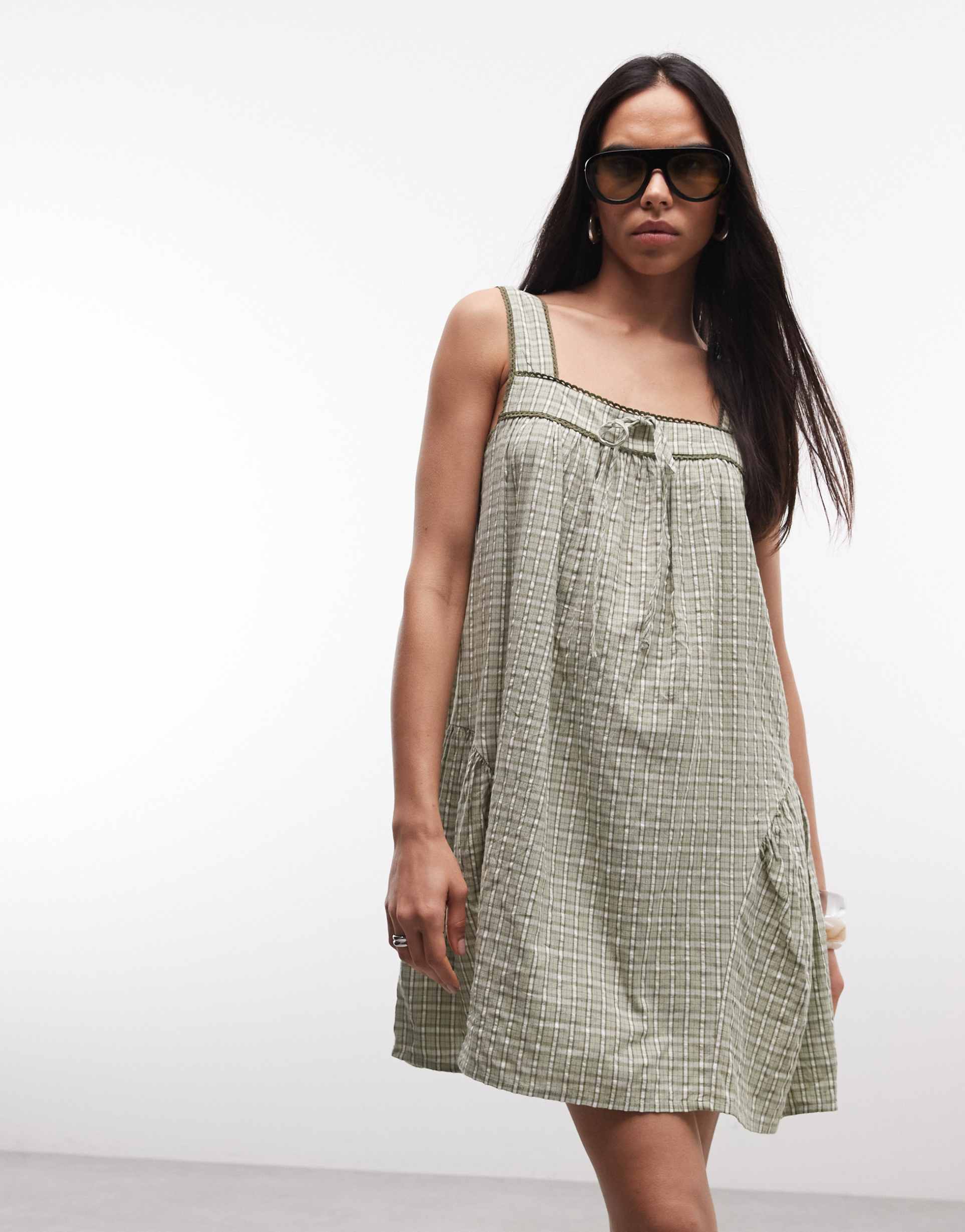 reclaimed vintage mini dress with lace trim and hip seam detail in green gingham