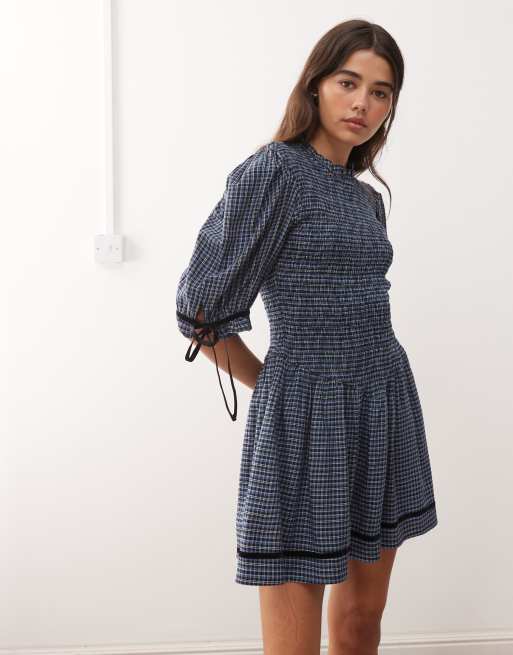 Reclaimed Vintage mini dress with shirred bodice and velvet trim in blue plaid