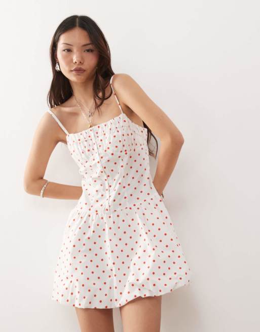 Reclaimed Vintage - Mini jurk met pofrok en haak-en oogsluiting in rode stippenprint