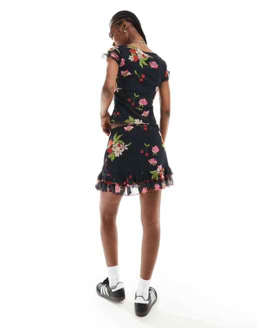 Reclaimed Vintage mini skirt with bows in black vintage floral and fruit print, 3 of 5