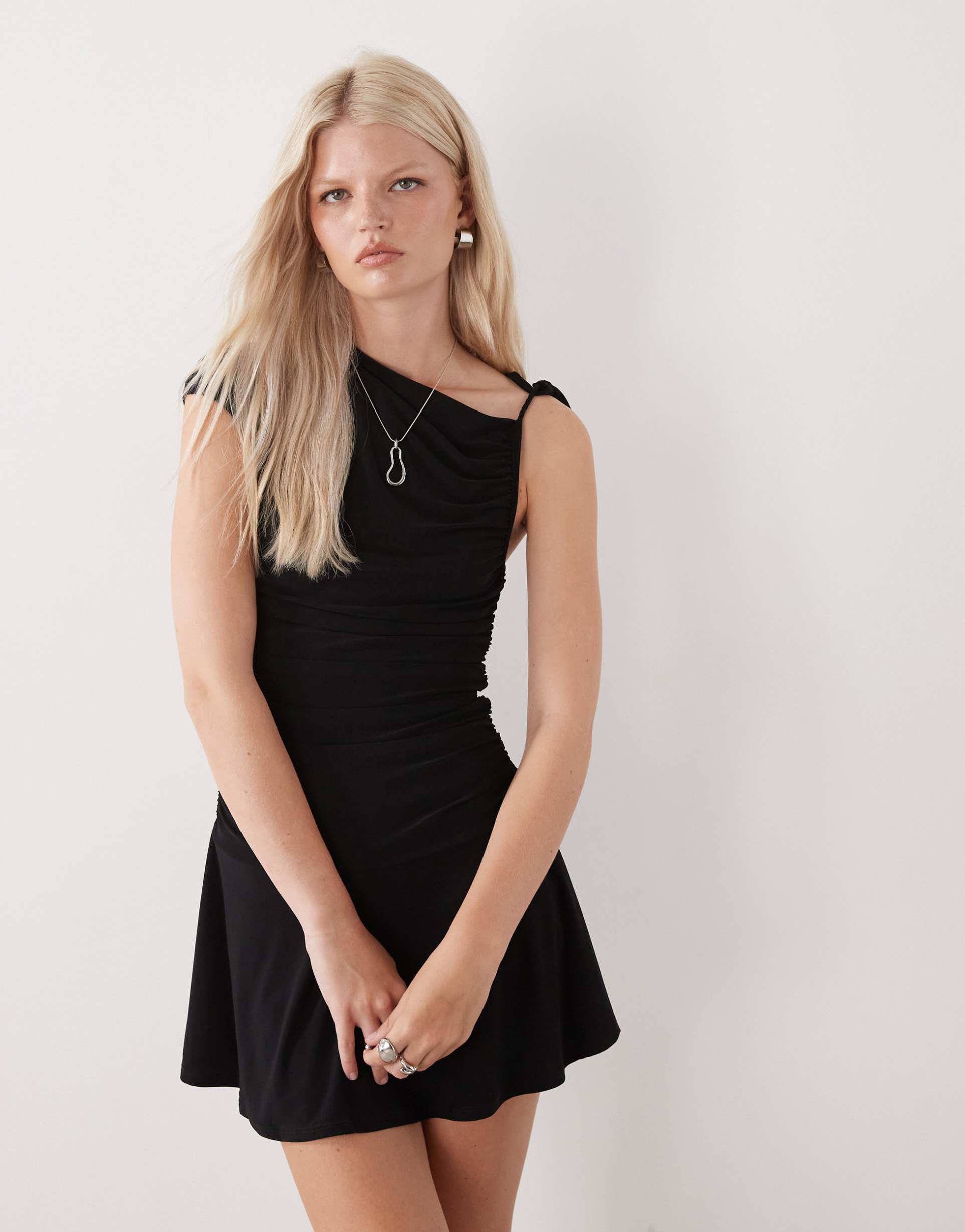 reclaimed vintage mini skort dress with shoulder tie detail in black