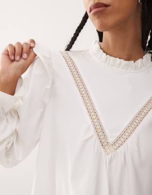 Reclaimed Vintage mini smock dress with inserted lace trims and ruffles in white
