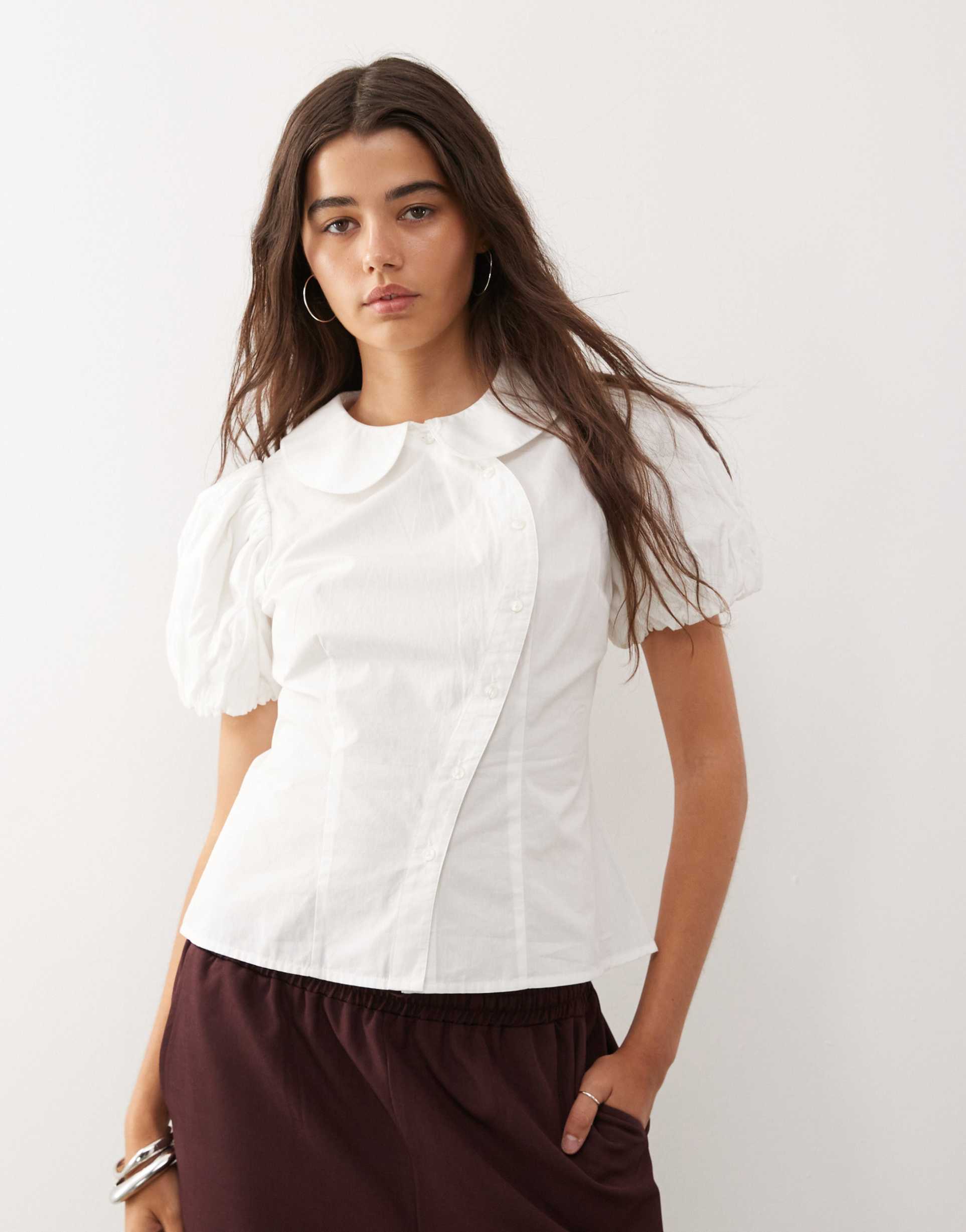 reclaimed vintage neat fit shirt with asymmetric buttons and puff sleeves in white