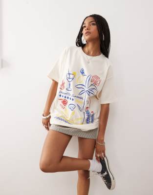 Reclaimed Vintage - Oversize-T-Shirt in Buttergelb mit Urlaubs-Kritzelmotiv