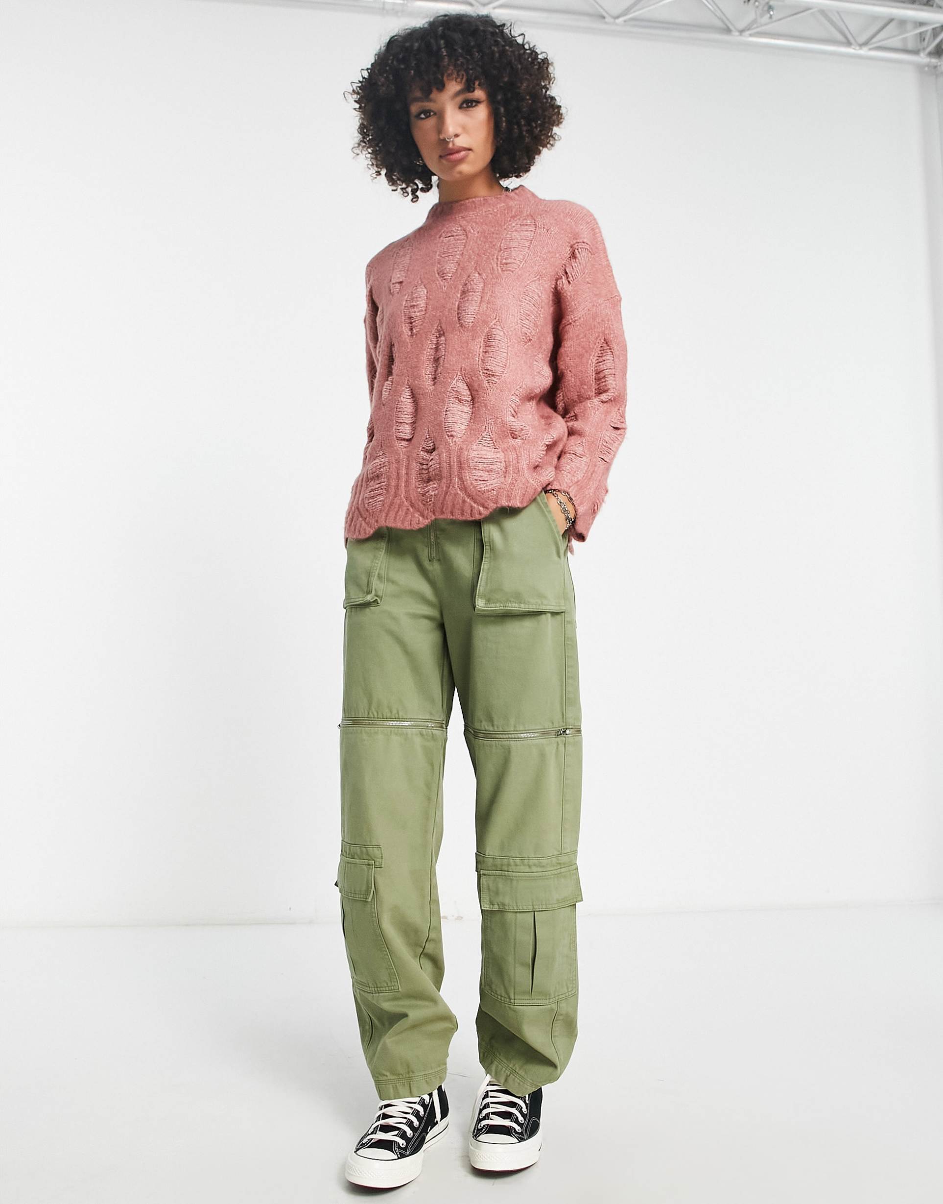 Reclaimed Vintage oversized jumper with laddering and distressing in pink