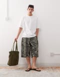 [Reclaimed Vintage] Reclaimed Vintage oversized longline denim jorts in camo animal print-Brown W32 Mixed animal print