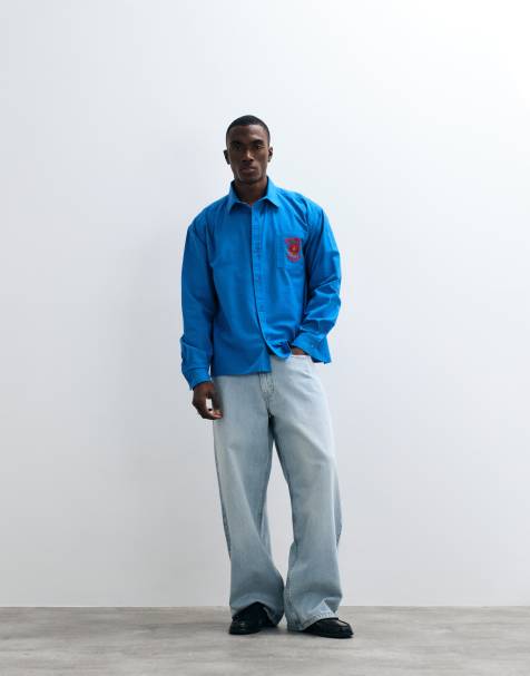Reclaimed Vintage oversized relaxed shirt with logo in cobalt blue - view 1