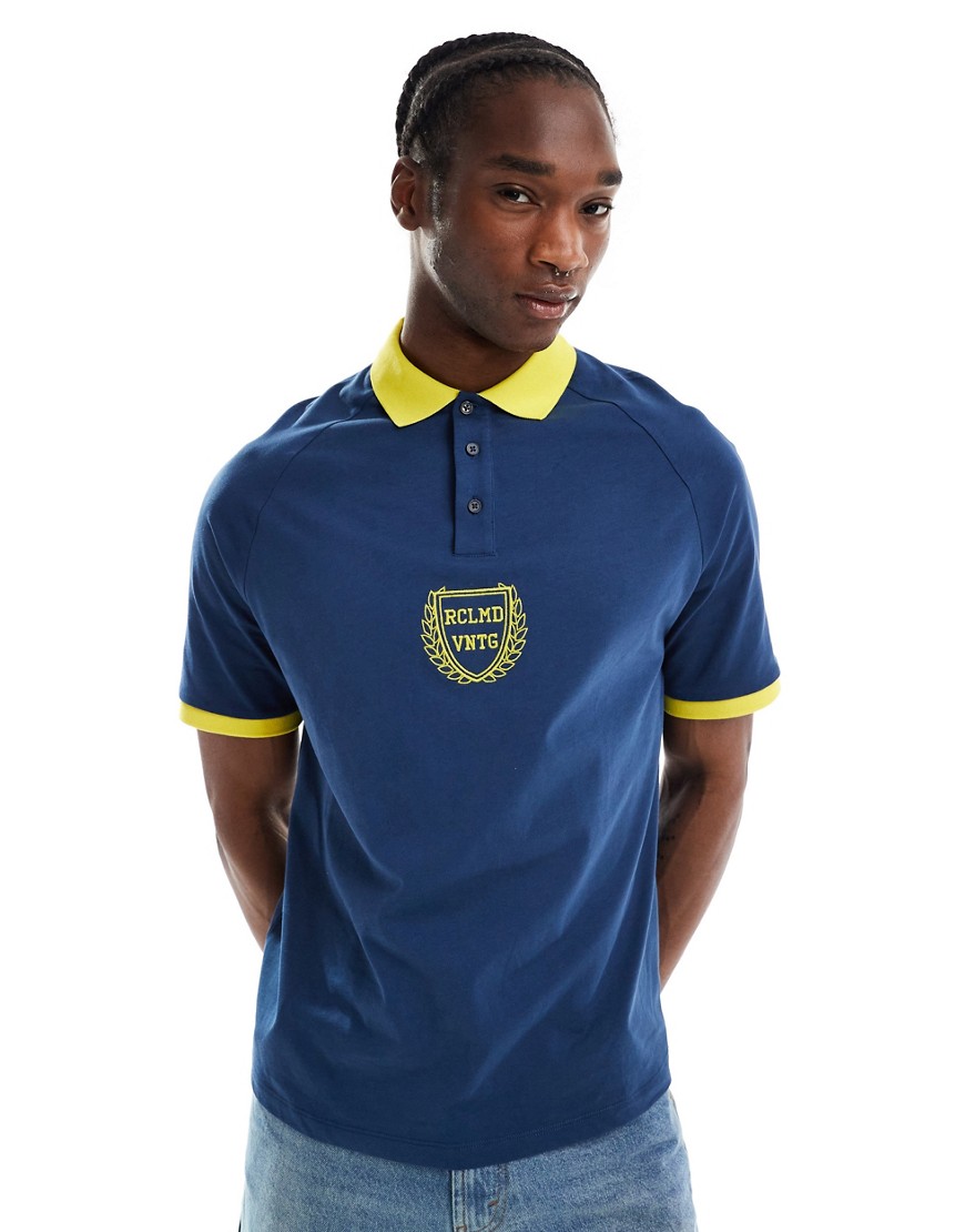 Reclaimed Vintage oversized sports polo top in navy and yellow-Blue
