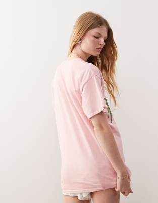 Reclaimed Vintage oversized t-shirt with palm tree holiday print in pink