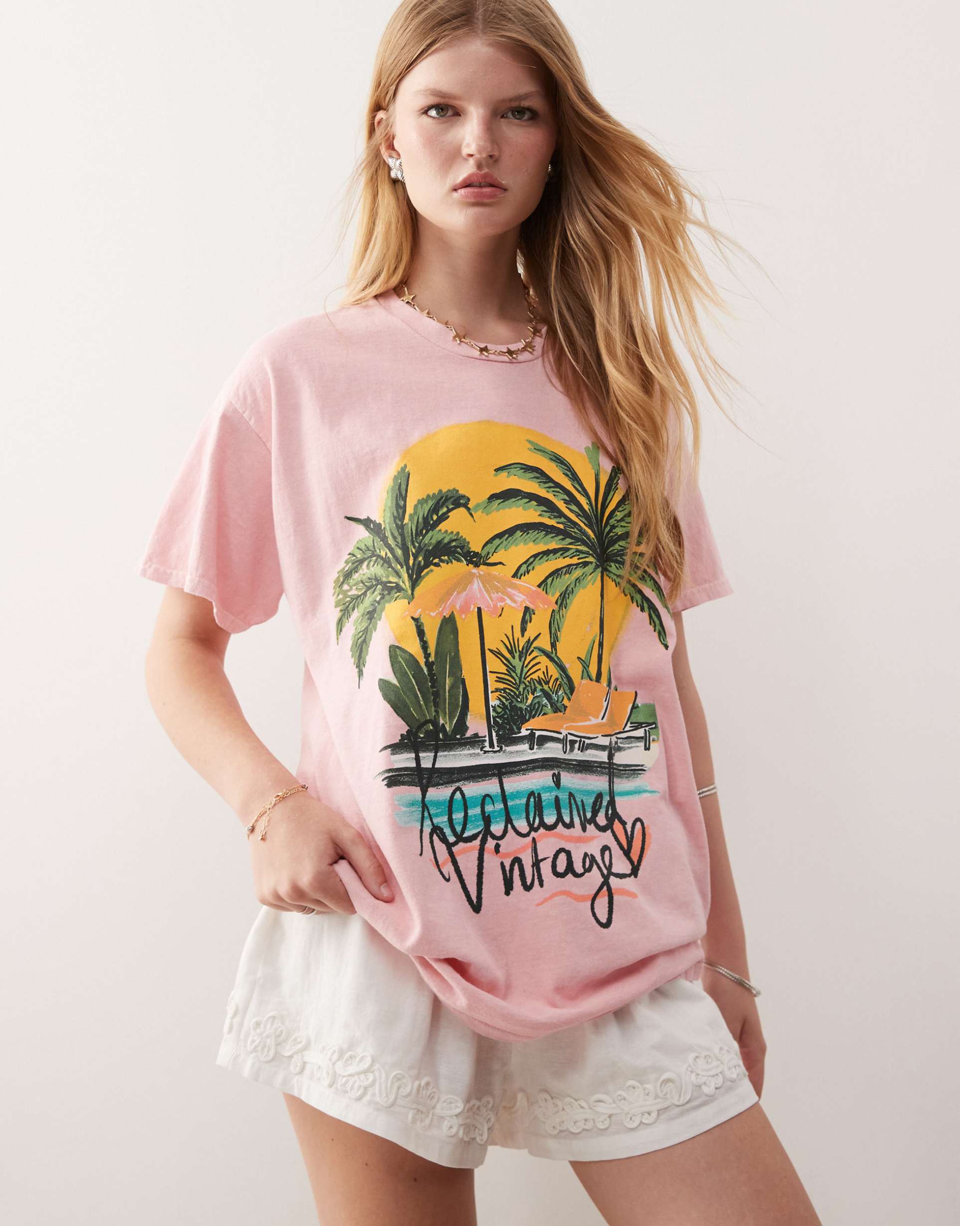 reclaimed vintage oversized t-shirt with palm tree vacation print in pink