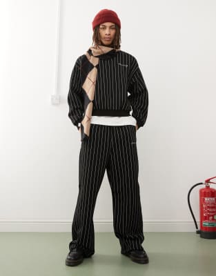 Reclaimed Vintage - Pantalon de jogging ample à fines rayures - Noir