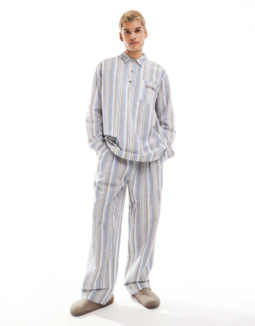 Reclaimed Vintage - Pantalon d'ensemble texturé à rayures et à enfiler
