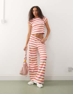 Reclaimed Vintage - Pantaloni con fondo ampio a righe multicolore in coordinato