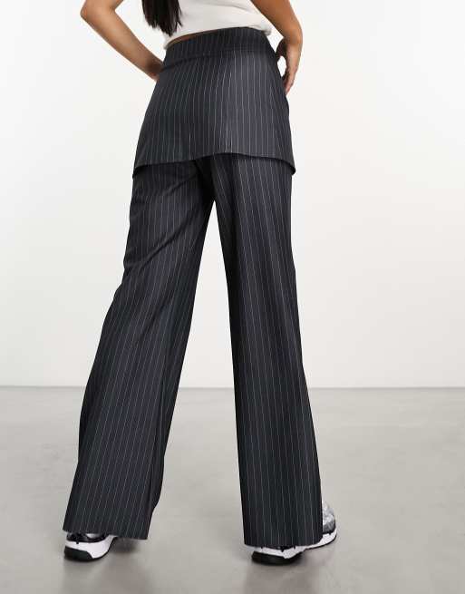 Pantaloni con gonna sovrapposta top