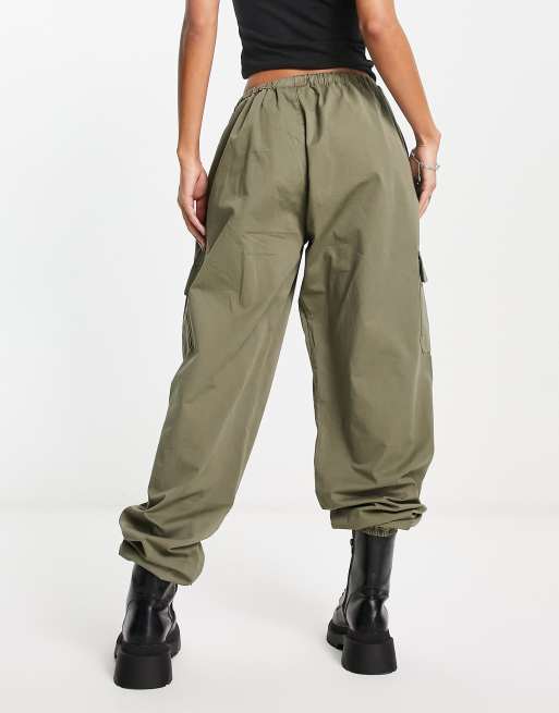 Reclaimed Vintage Revived Camo Cargo Trousers In Orange, $42, Asos