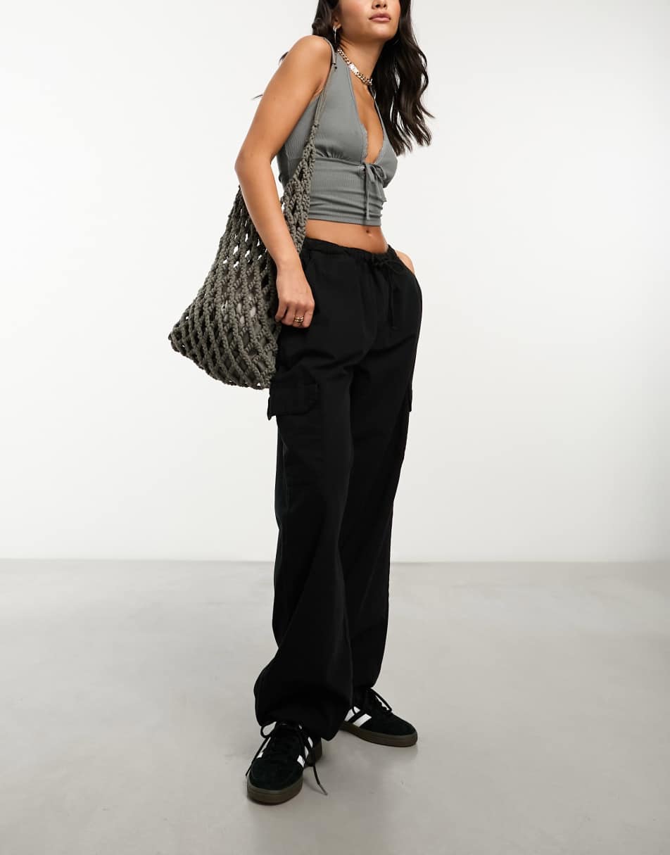 Reclaimed Vintage parachute cargo trousers in washed black