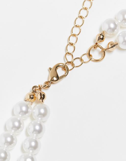 Reclaimed Vintage pearl necklace with bow drop in gold