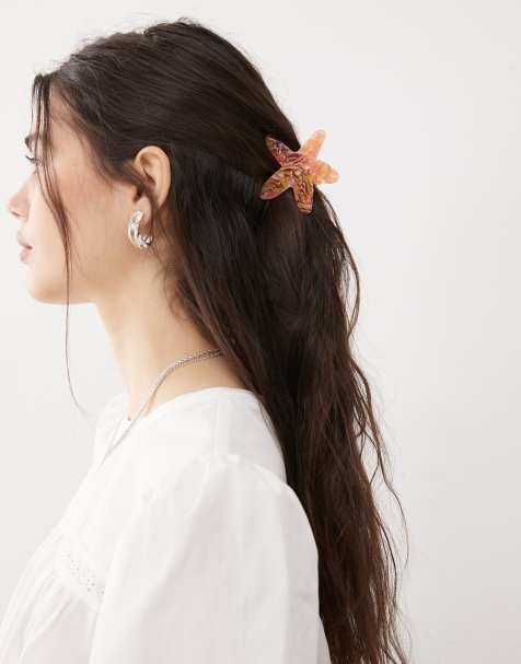 Reclaimed Vintage hair claw clip with starfish in orange