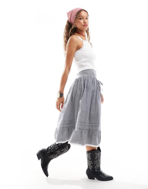 Reclaimed Vintage - Prairierok met verlaagde taille met strikken en gingham ruit in blauw en wit