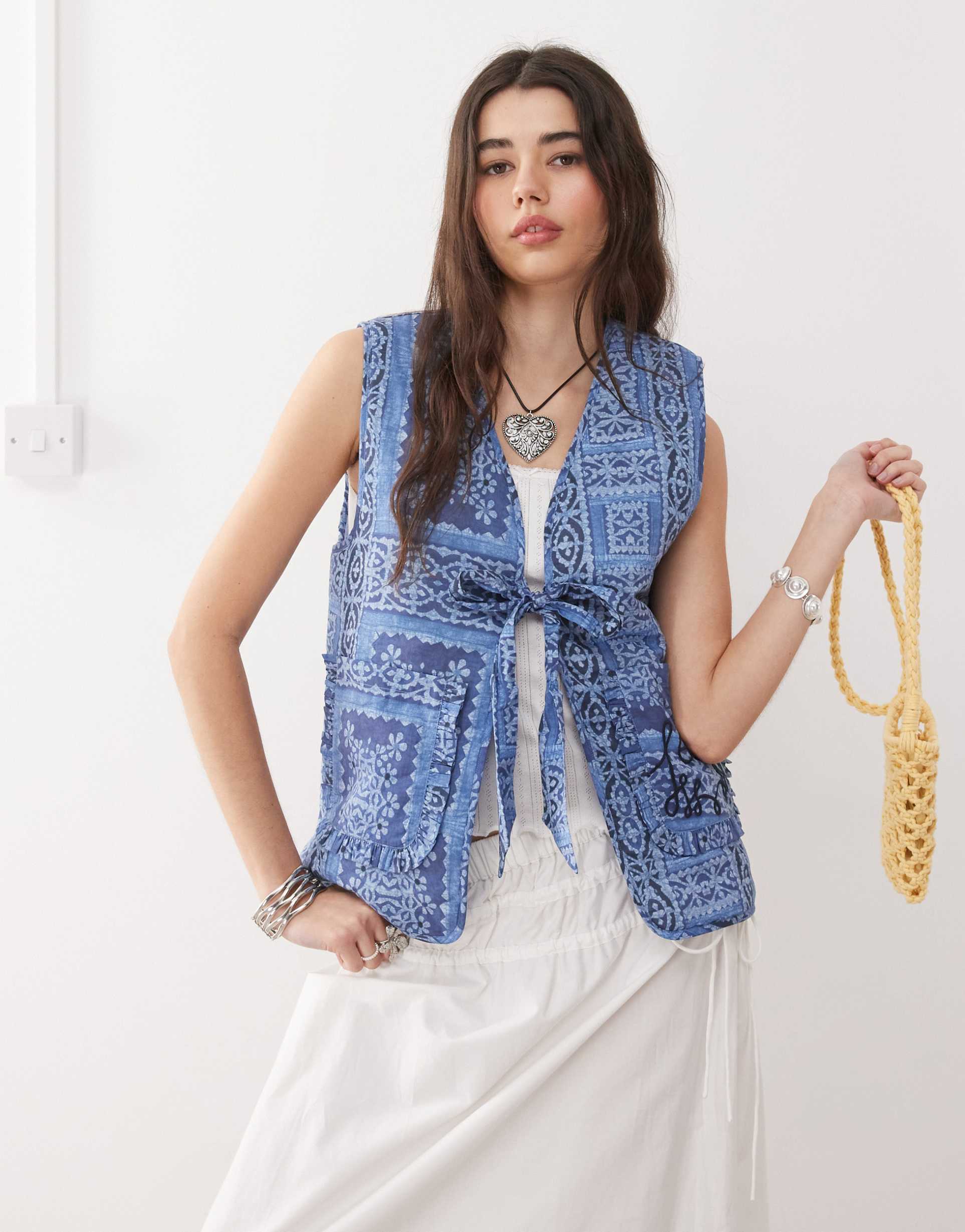 reclaimed vintage printed tie front quilted reversible vest in powder blue print