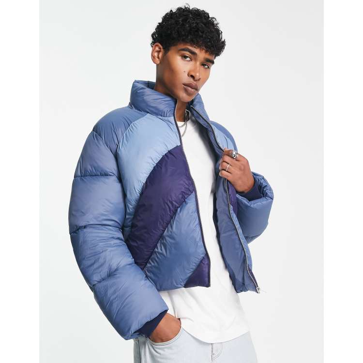 Reclaimed Vintage puffer jacket in colourblock blue | ASOS