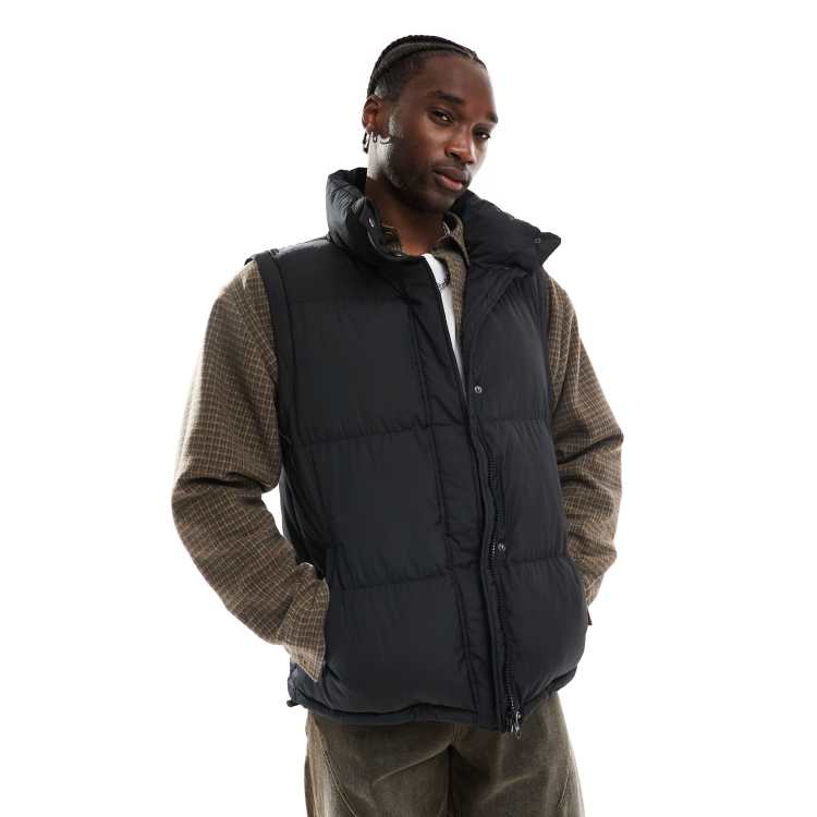 Reclaimed Vintage puffer vest in black | ASOS