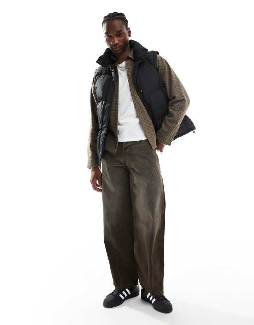 Reclaimed Vintage puffer vest in black | ASOS