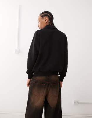 Reclaimed Vintage quarter zip embroidered sweatshirt in black