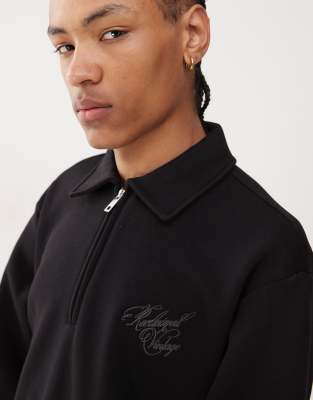 Reclaimed Vintage quarter zip embroidered sweatshirt in black