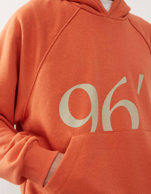 Reclaimed Vintage oversized hoodie with graphic in washed red