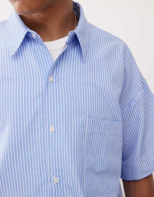 Reclaimed Vintage short sleeve boxy shirt in blue pinstripes