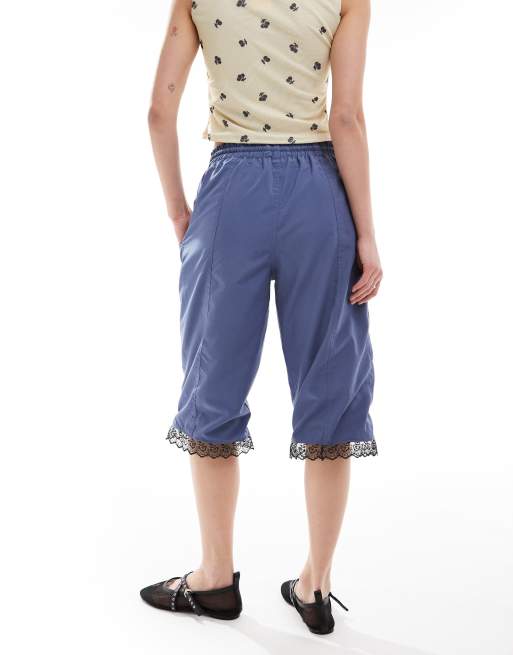 Reclaimed Vintage Revived x Glass Onion longline track short with