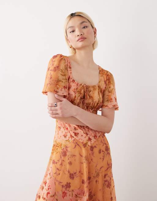 Reclaimed Vintage - Robe rétro longue à imprimé fleuri avec manches cape et godets - Doré, 2 de 4