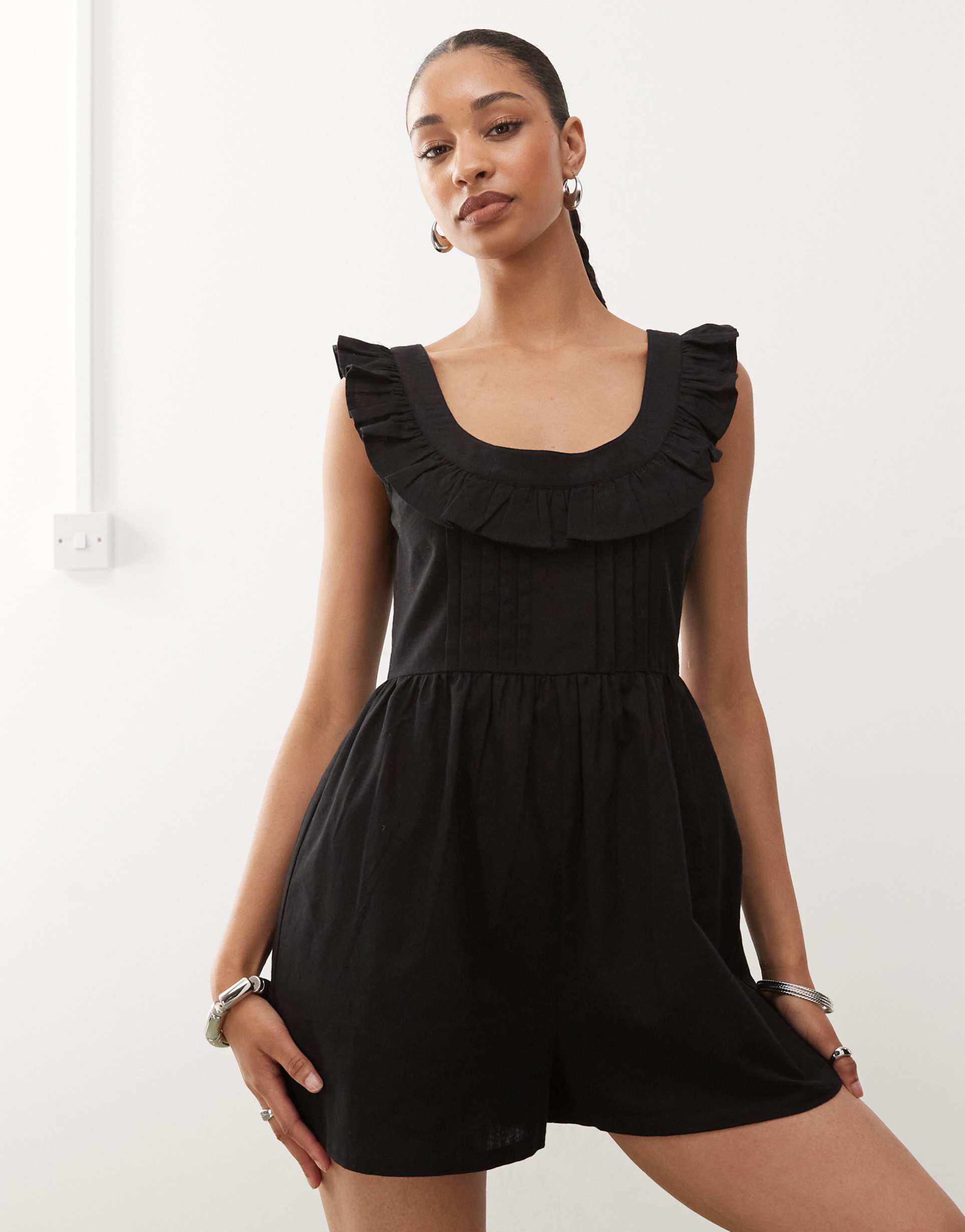 reclaimed vintage romper with ruffle neck in black