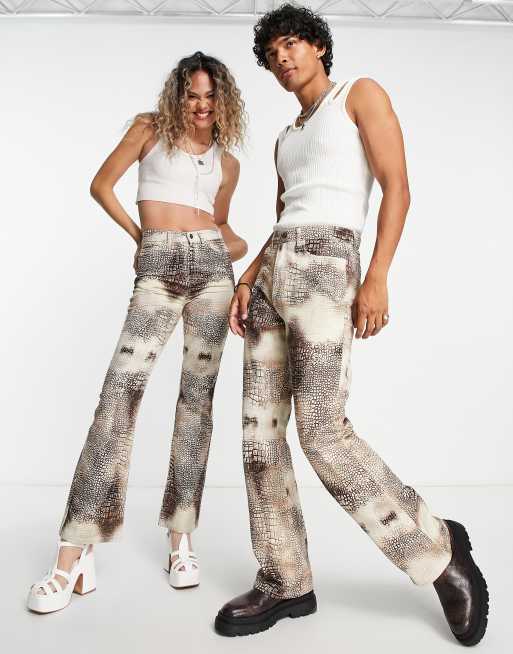 Flared store pants slangenprint