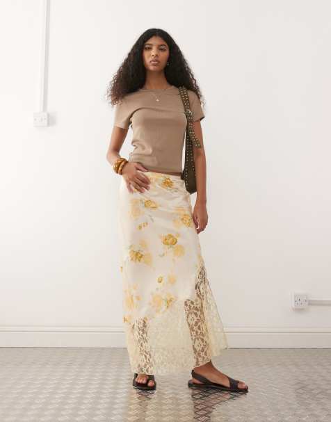 Reclaimed Vintage satin midi skirt with asymmetric hem and lace panel in yellow floral print