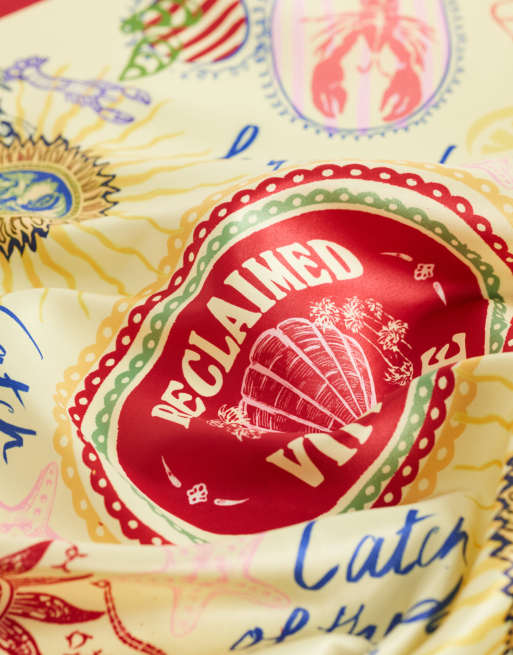 Reclaimed Vintage satin oversized headscarf with vacation print and stripe border in yellow and red, 2 of 3