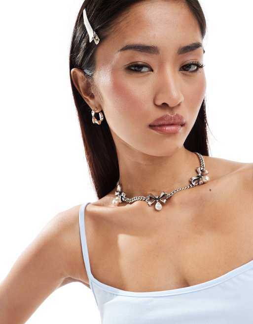 Reclaimed Vintage - Schakelketting met strikjes en imitatieparels in zilver