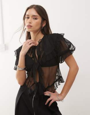Reclaimed Vintage Reclaimed Vintage sheer tea top with puffball sleeve and collar in black tulle