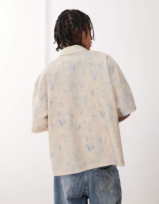 Reclaimed Vintage short sleeve boxy shirt with blue floral print detail in linen look