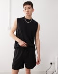 [Reclaimed Vintage] Reclaimed Vintage shorter length jersey shorts in black XS Black